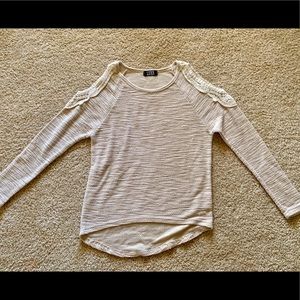 Sweater with open shoulder